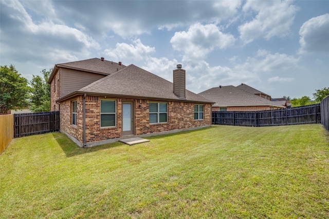 5844 Sunny Meadow Ln, Grand Prairie, TX 75052 - back of property with brick siding, a chimney, and roof with shingles