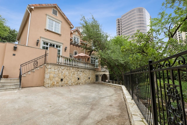 3725 Turtle Creek Blvd Unit A, Dallas, TX 75219 - view of patio / terrace with stairs and fence