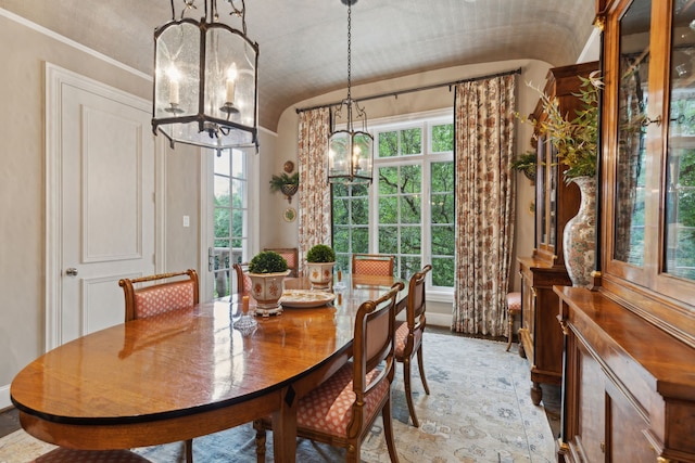 3725 Turtle Creek Blvd Unit A, Dallas, TX 75219 - dining space with a chandelier, lofted ceiling, and plenty of natural light