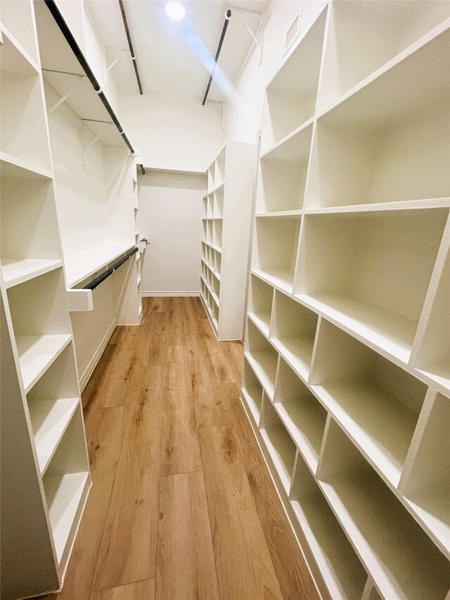 113 County Road 3198, Decatur, TX 76234 - spacious closet with light wood finished floors