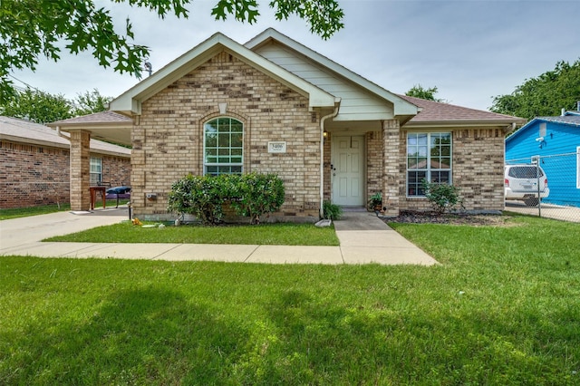 3406 Nomas St, Dallas, TX 75212 - view of front of home with a front lawn and brick siding