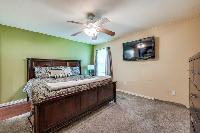 3406 Nomas St, Dallas, TX 75212 - bedroom featuring baseboards, ceiling fan, and light colored carpet