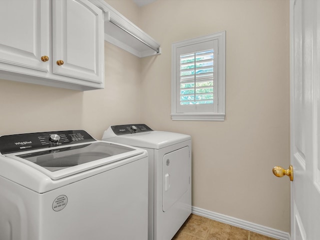 1457 Susan Ln, Carrollton, TX 75007 - laundry room featuring separate washer and dryer, baseboards, and cabinet space