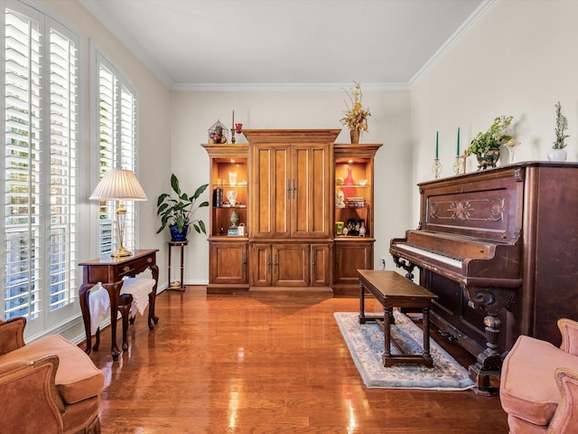 1457 Susan Ln, Carrollton, TX 75007 - living area featuring crown molding, wood finished floors, and baseboards