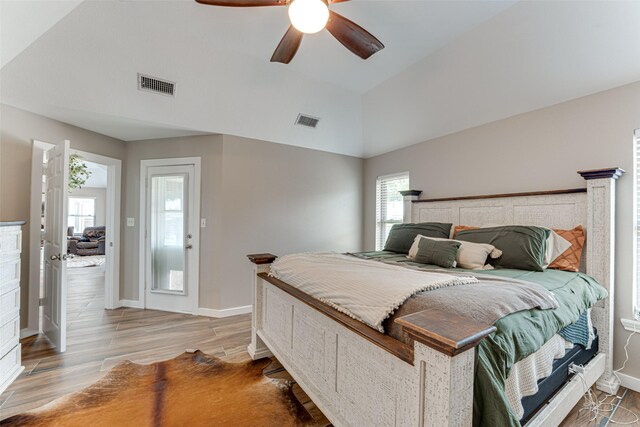 6367 Bridle Trl, Caddo Mills, TX 75135 - bedroom featuring light wood-type flooring, baseboards, ceiling fan, and lofted ceiling
