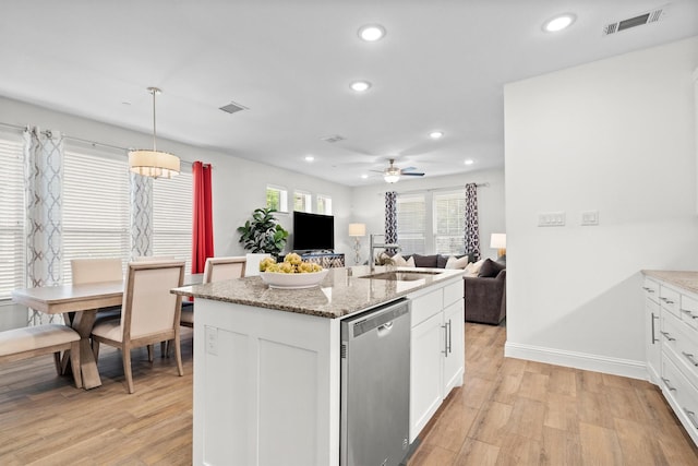 2606 High Cotton Ln, Garland, TX 75042 - kitchen with dishwasher, recessed lighting, light wood-type flooring, a sink, and ceiling fan