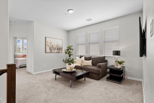 2606 High Cotton Ln, Garland, TX 75042 - living room with carpet floors and baseboards