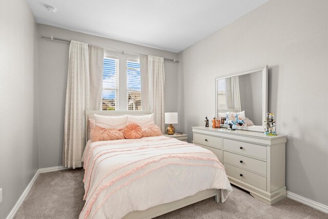 2606 High Cotton Ln, Garland, TX 75042 - bedroom with light carpet and baseboards