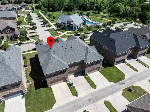 2606 High Cotton Ln, Garland, TX 75042 - aerial view of residential area with a pool area