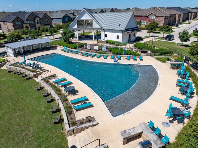 2606 High Cotton Ln, Garland, TX 75042 - community pool featuring a residential view