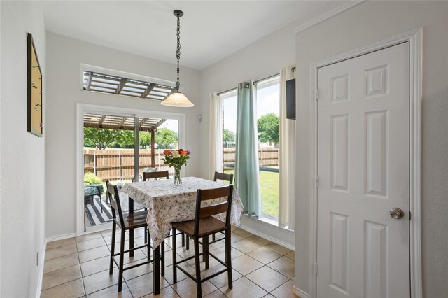 4503 Aspen Glen Rd, Plano, TX 75024 - dining area with light tile patterned floors and baseboards