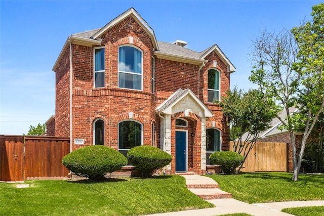 4503 Aspen Glen Rd, Plano, TX 75024 - traditional-style house featuring brick siding and roof with shingles