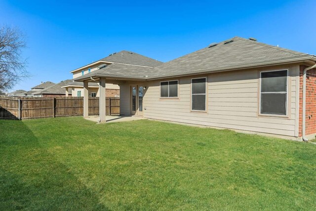 1626 Kawati Way, Krum, TX 76249 - rear view of house featuring a patio area, roof with shingles, and brick siding