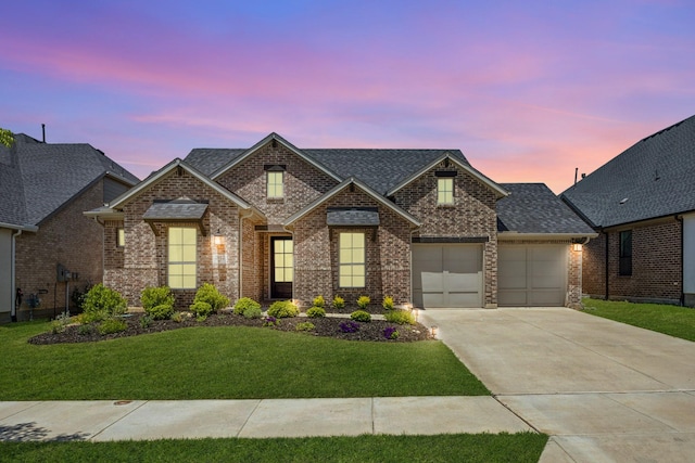2812 Quill Ln, Northlake, TX 76247 - view of front of home with driveway, a yard, and brick siding