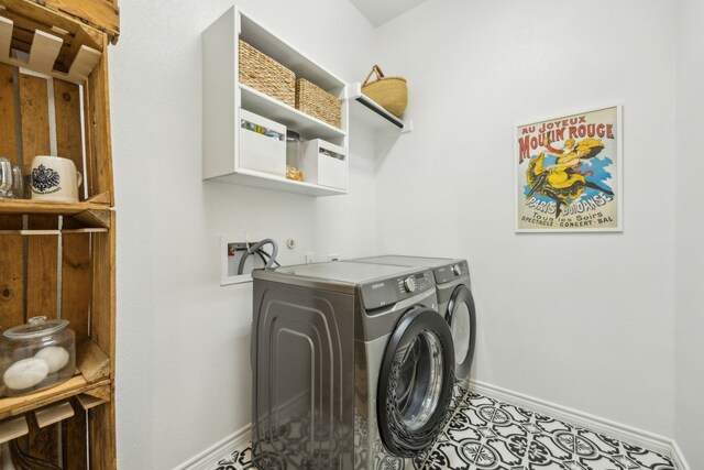 2812 Quill Ln, Northlake, TX 76247 - washroom featuring washing machine and dryer and baseboards