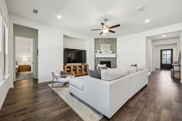 2812 Quill Ln, Northlake, TX 76247 - living area with a ceiling fan, dark wood-style floors, a tiled fireplace, baseboards, and recessed lighting