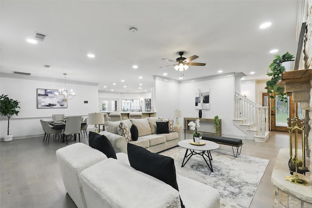 1430 Black Hawk Trl, Nemo, TX 76070 - living area with stairway, recessed lighting, ceiling fan, ornamental molding, and a chandelier