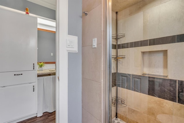 4109 Twin Falls St, Irving, TX 75062 - full bathroom with a tile shower and wood finished floors