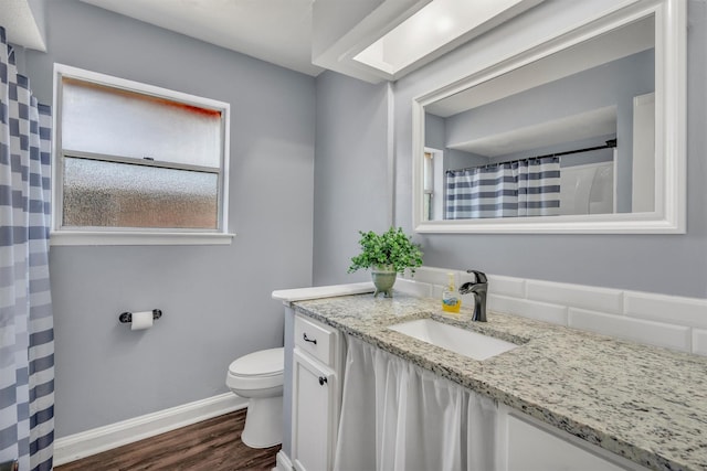 4109 Twin Falls St, Irving, TX 75062 - bathroom featuring vanity and wood finished floors