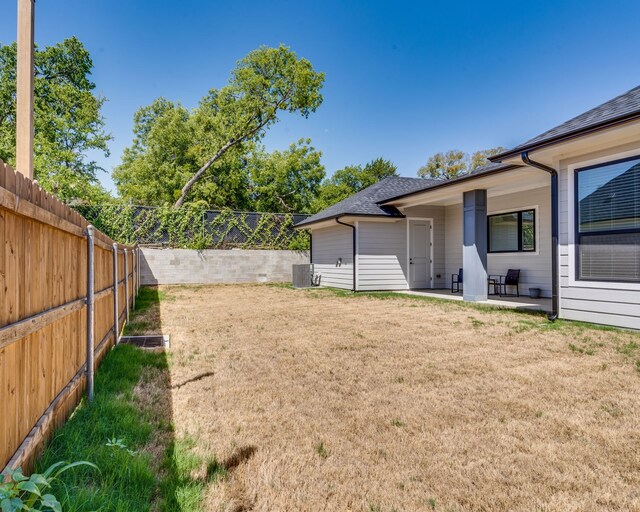 513 Dillon St, Waxahachie, TX 75165 - view of yard featuring a patio area and cooling unit
