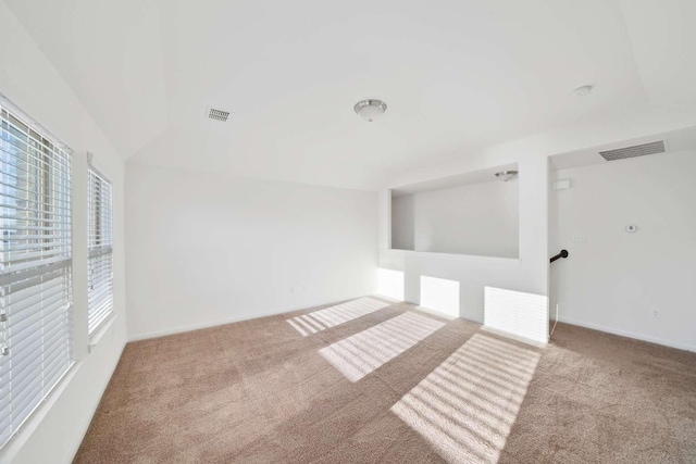 107 Mesa Verde Ct, Forney, TX 75126 - unfurnished room featuring carpet, baseboards, and vaulted ceiling