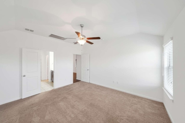 107 Mesa Verde Ct, Forney, TX 75126 - unfurnished bedroom with vaulted ceiling, light carpet, baseboards, and ceiling fan