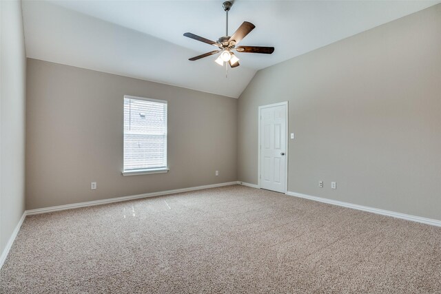 5504 Seneca Dr, Plano, TX 75094 - spare room with light carpet, baseboards, ceiling fan, and lofted ceiling