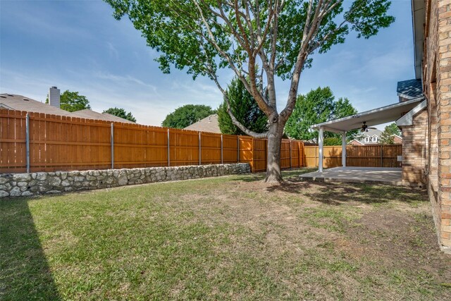 5504 Seneca Dr, Plano, TX 75094 - view of yard featuring ceiling fan and a patio area