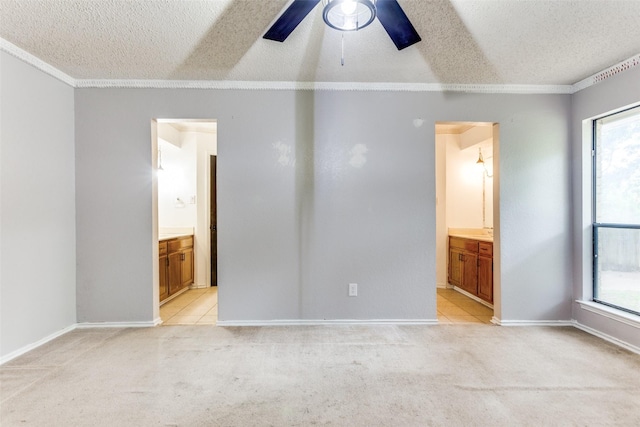 104 NE Rosamond St, Burleson, TX 76028 - unfurnished room with a textured ceiling, ornamental molding, a ceiling fan, light carpet, and healthy amount of natural light
