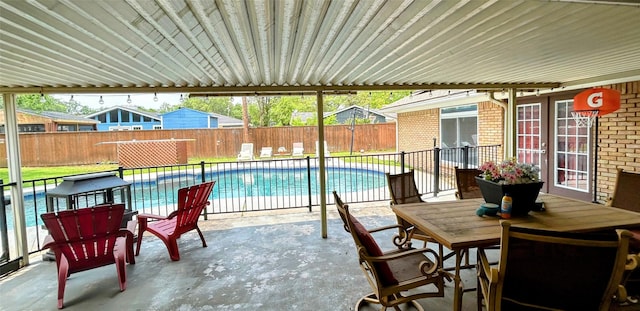 124 Circle Dr, Kaufman, TX 75142 - view of patio / terrace with a fenced backyard and outdoor dining space