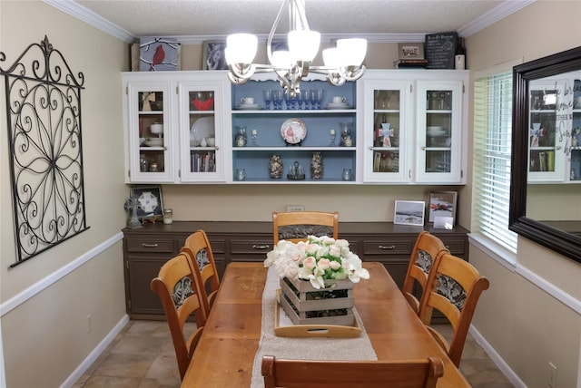 124 Circle Dr, Kaufman, TX 75142 - dining area featuring a chandelier, crown molding, and baseboards
