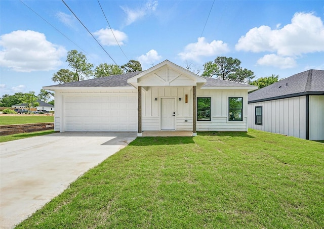 912 Layne Dr, Denison, TX 75020 - view of front of house featuring board and batten siding, a front yard, concrete driveway, a garage, and a shingled roof