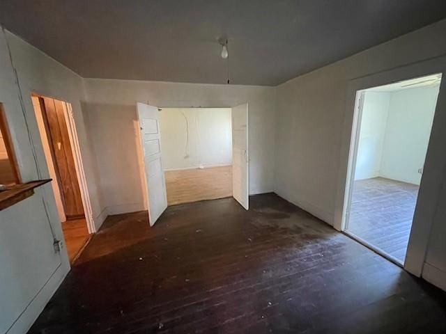 100 E Hill St, Woodson, TX 76491 - spare room featuring wood-type flooring