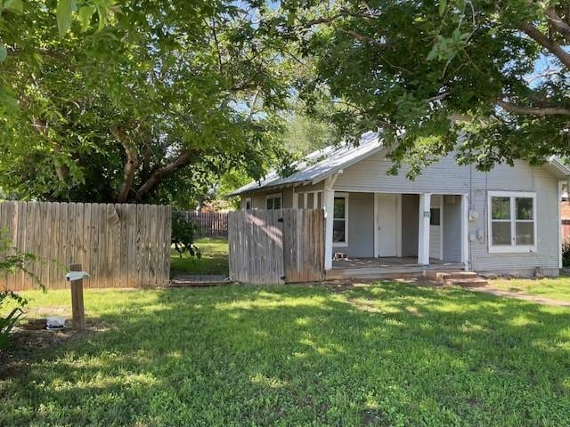 100 E Hill St, Woodson, TX 76491 - view of yard with covered porch