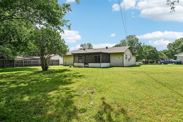 207 Bluebird Cir, Denton, TX 76209 - rear view of property with a sunroom