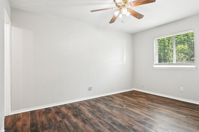207 Bluebird Cir, Denton, TX 76209 - empty room featuring dark wood-style flooring, baseboards, and ceiling fan