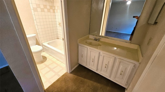 18 E Townhouse Ln Unit 31, Grand Prairie, TX 75052 - full bathroom with toilet, vanity, and shower / bathtub combination