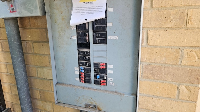 18 E Townhouse Ln Unit 31, Grand Prairie, TX 75052 - utility room featuring electric panel
