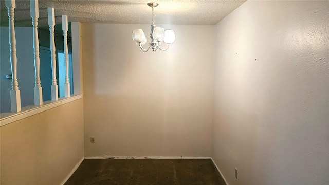 18 E Townhouse Ln Unit 31, Grand Prairie, TX 75052 - spare room with a chandelier, baseboards, a textured ceiling, and carpet flooring