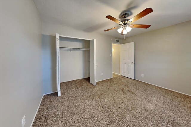 1625 Stockton Trl, Plano, TX 75023 - unfurnished bedroom featuring a closet, carpet, baseboards, and ceiling fan