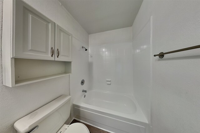 1625 Stockton Trl, Plano, TX 75023 - bathroom featuring toilet and shower / washtub combination