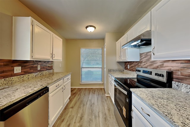 1625 Stockton Trl, Plano, TX 75023 - kitchen featuring stainless steel appliances, under cabinet range hood, white cabinetry, and light wood-type flooring