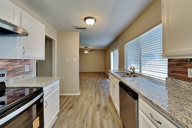 1625 Stockton Trl, Plano, TX 75023 - kitchen with range with electric cooktop, stainless steel dishwasher, a sink, ceiling fan, and under cabinet range hood