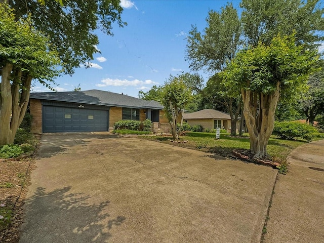 6927 Clearglen Dr, Dallas, TX 75232 - ranch-style home featuring driveway, a garage, and brick siding