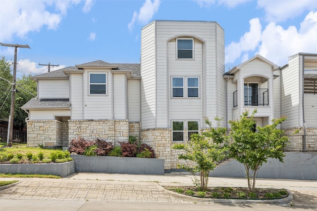 1964 W Davis St, Dallas, TX 75208 - view of front facade with stone siding and a shingled roof
