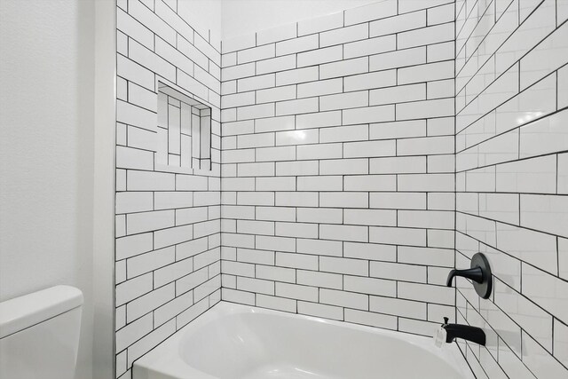 9413 Prairieview Dr, Fort Worth, TX 76134 - bathroom featuring toilet and shower / washtub combination
