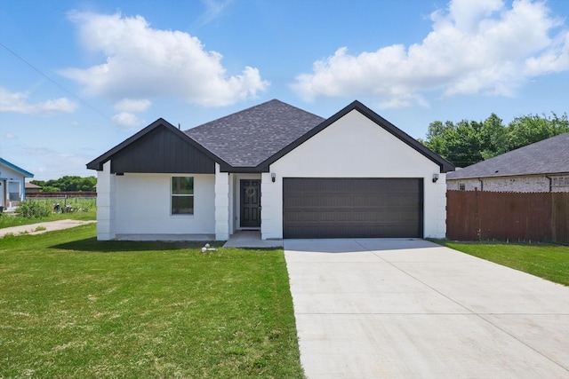 9413 Prairieview Dr, Fort Worth, TX 76134 - view of front facade with a shingled roof, an attached garage, and driveway