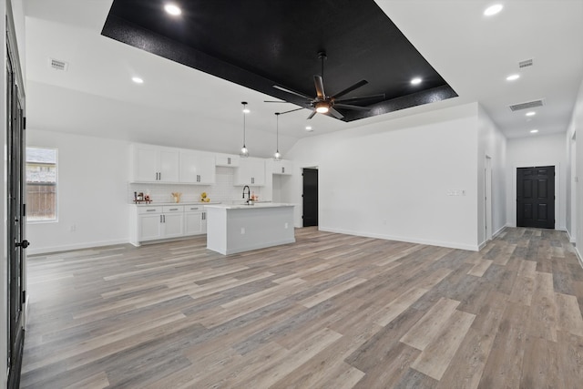 9413 Prairieview Dr, Fort Worth, TX 76134 - unfurnished living room featuring recessed lighting, a ceiling fan, light wood finished floors, baseboards, and a sink