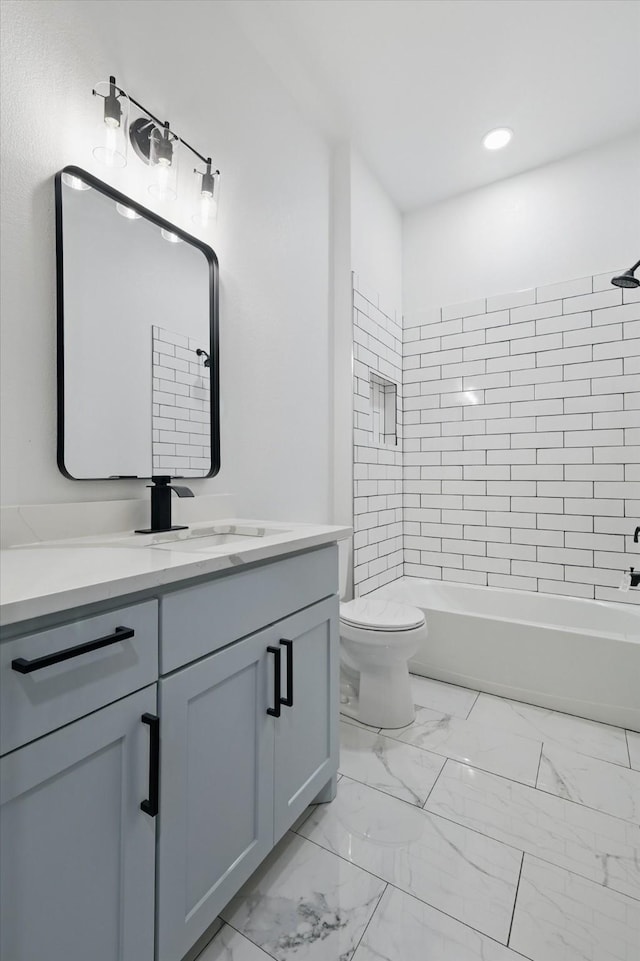 9413 Prairieview Dr, Fort Worth, TX 76134 - full bath featuring marble finish floors, toilet, vanity, shower / washtub combination, and recessed lighting