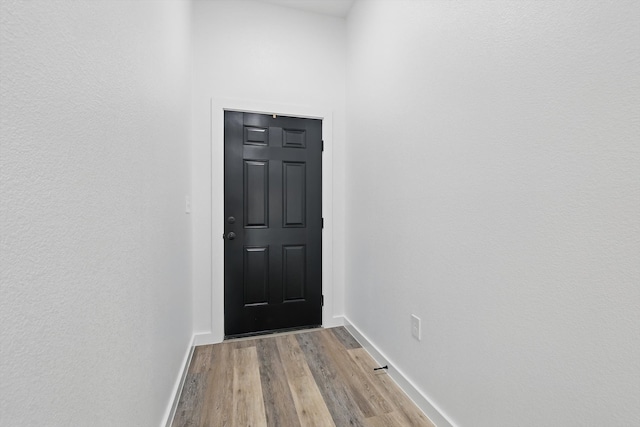 9413 Prairieview Dr, Fort Worth, TX 76134 - doorway with light wood-style flooring and baseboards